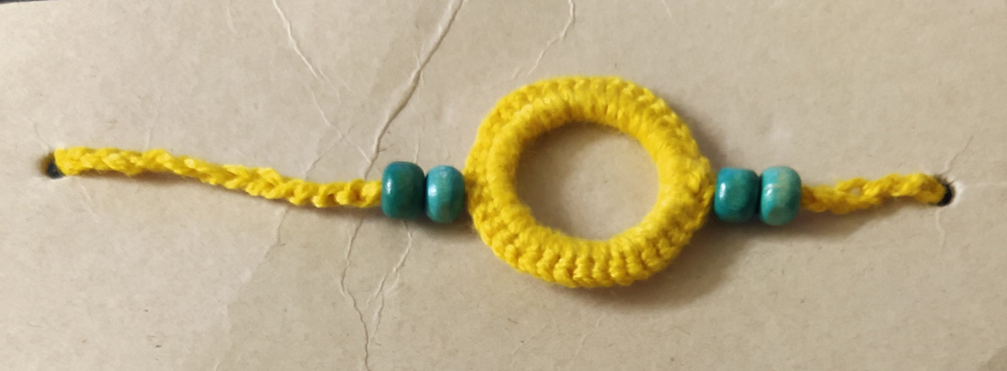 Handmade Crochet Rakhi - Yellow Ring