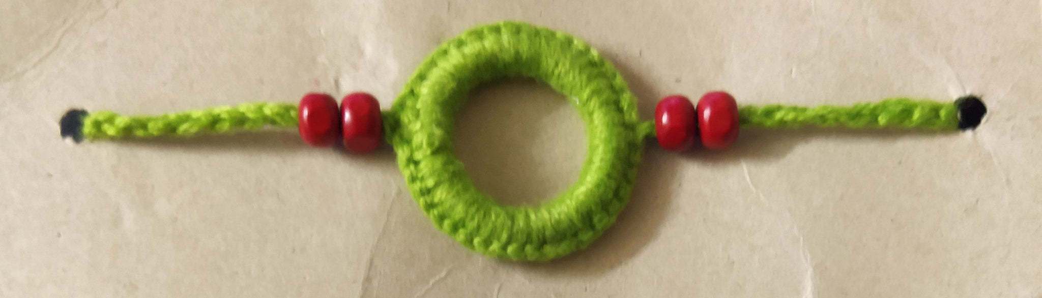 Handmade Crochet Rakhi - Green Ring