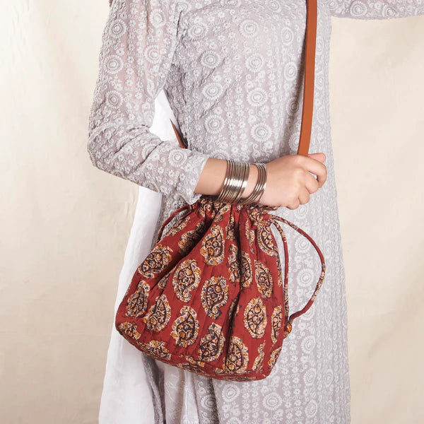 Suneeta Bucket Sling Bag Maroon gestures.in