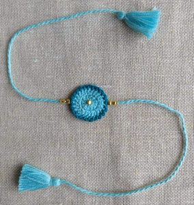 Handmade Crochet Rakhi - Blue Dandelion
