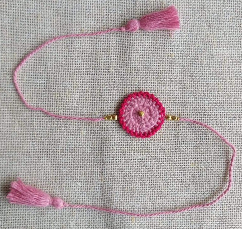 Handmade Crochet Rakhi - Pink Dandelion