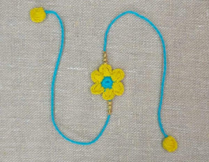 Handmade Crochet Rakhi with Beads - Yellow & Blue Flower