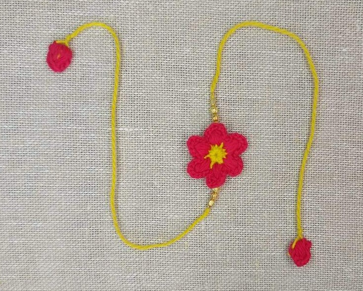 Handmade Crochet Rakhi with Beads - Red Flower