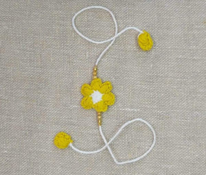 Handmade Crochet Rakhi with Beads - Yellow & White Flower