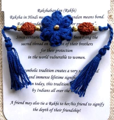 Handmade Crochet Rakhi with Rudraksh - Navy Blue flower